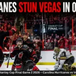 Carolina Hurricanes players celebrate an overtime game-winning goal against the Vegas Golden Knights during Stanley Cup Final Game 2 2026.